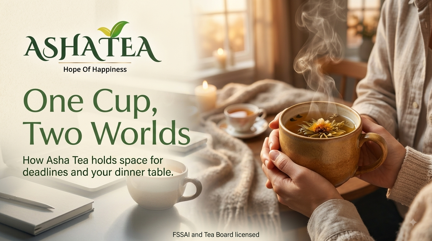 Warm hands holding a steaming cup of tea with Asha Tea logo, blending workspace and home comfort